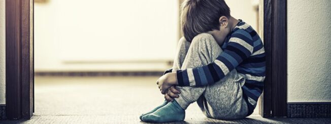 Boy Sitting Alone